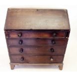 A George III elm bureau the slope front enclosing fitted interior over four graduated drawers