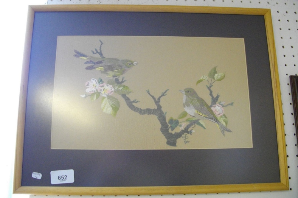 An embroidered picture of green finches - framed and glazed, 20 x 34cm