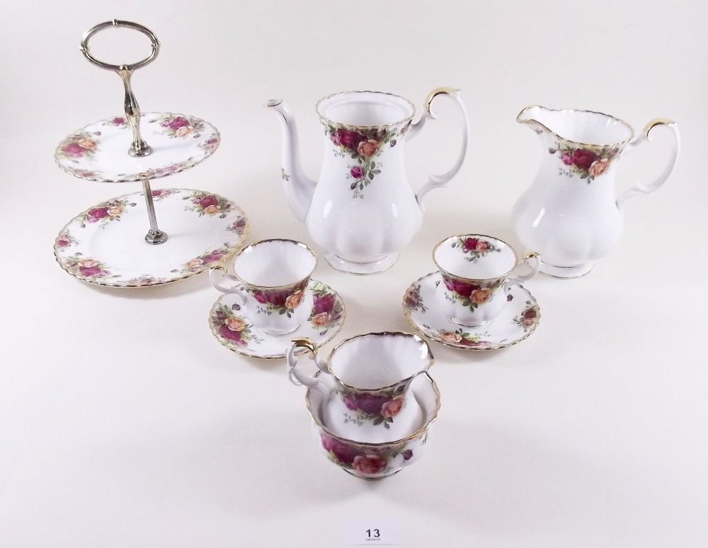 A Royal Albert Country Roses coffee set comprising: coffee pot (no lid), six coffee cups and