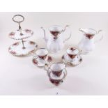 A Royal Albert Country Roses coffee set comprising: coffee pot (no lid), six coffee cups and