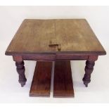 A Victorian elm windout dining table and two interleaves