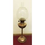 A Victorian brass and copper oil lamp with etched shade