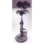 A large Victorian electro plated centre piece in the form of a palm tree and stag, a/f, 60cm high