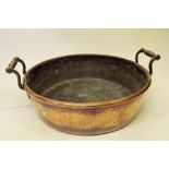 A Victorian copper two handled preserving pan
