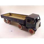 A Mettoy tin plate clockwork articulated lorry, the tyres marked 'Dunlop Fort' - 42cm