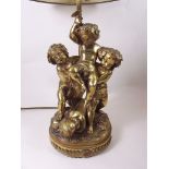 Jean Jacques Feuchere (1807-1852) - gilt bronze group of four playful cherubs mounted as a table