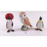 A Beswick barn owl and two penguins