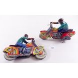 Two Russian tin plate clockwork motorbikes - one has no stabilisers and key