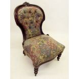 A Victorian spoon back chair with carved decoration