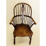 A late 19th century Windsor chair with crinoline stretcher