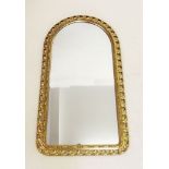 An arch top gilt wood mirror
