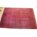 A red Persian style geometric rug - 5.5 x 8ft approx