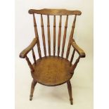 A spindle back farmhouse chair