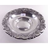 A sterling silver dish with shell decoration to rim, approx. 300g