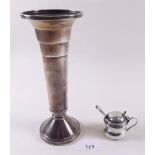 A silver plated vase and a silver mustard pot