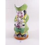 A large toby jug 23 cm tall