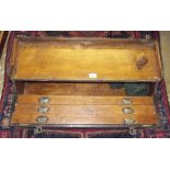 An old carpenters tool box with fitted drawers to interior