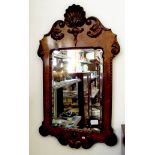 An early 20th century Georgian style mirror with shell decoration