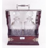 A two bottle mahogany and silver plated tantalus