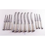 A set of 19th century silver handled pistol grip knives - six large and seven small, marked
