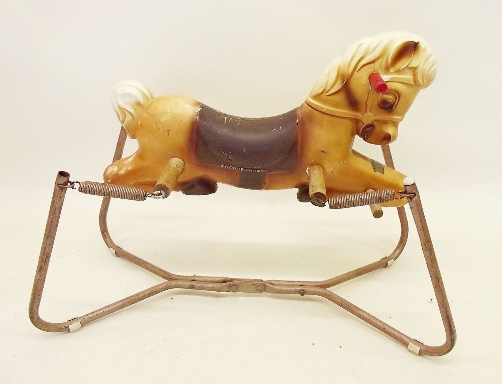 A 1950's plastic rocking horse