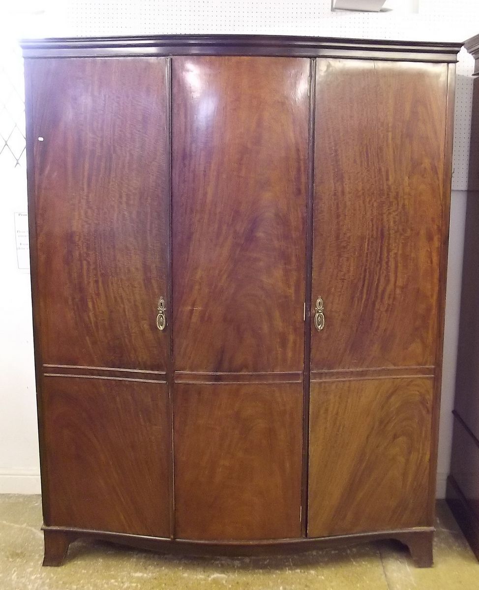 A 1920's mahogany triple wardrobe