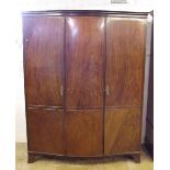 A 1920's mahogany triple wardrobe