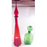 A tall 1960's red glass decanter and a green glass decanter