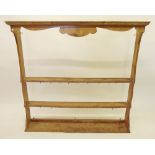 A 19th century pine plate rack