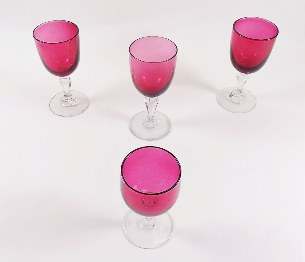 Four Victorian cranberry wine glasses