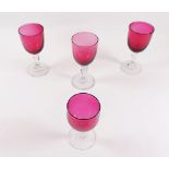 Four Victorian cranberry wine glasses