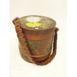 A floral painted wooden bucket