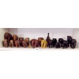 A quantity of wooden elephants