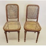 A pair of Edwardian cane seated bedroom chairs