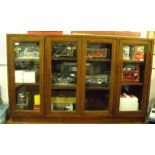 A four door mahogany glazed bookcase - 159cm x 29cm deep with key