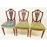 Three mahogany Hepplewhite style shield back dining chairs