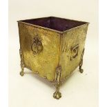 A brass coal scuttle