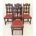 A set of four late Victorian oak side chairs with bobbin turned supports