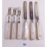 Three silver and mother of pearl dessert knives and forks