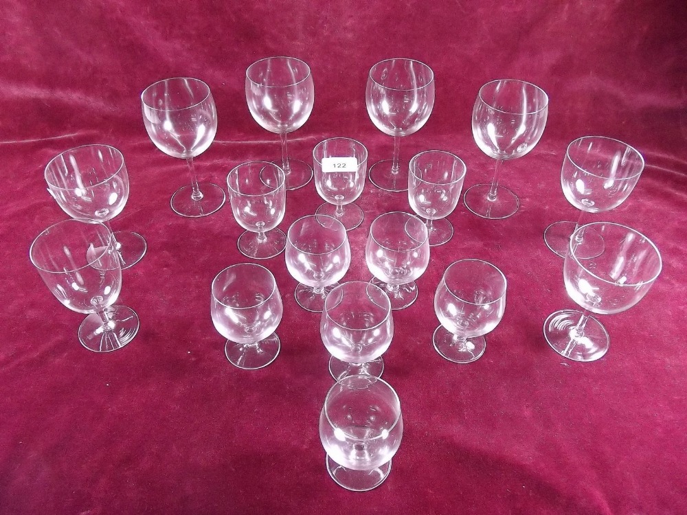 A part suite of early 20th century drinking glasses comprising:- four white wine glasses, three