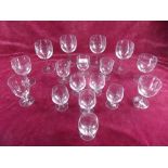 A part suite of early 20th century drinking glasses comprising:- four white wine glasses, three