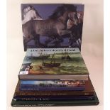 A selection of large format books, including Equus, Iraq Campaign, For Crown and Country and