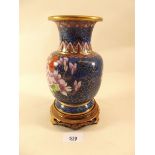 A cloisonne vase and stand