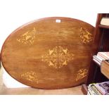A Victorian oval mahogany satinwood inlaid table top
