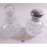 A cut glass scent bottle with silver lid Birmingham 2000 and a cut glass scent bottle, maker KH