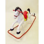 A 1950's painted metal rocking horse