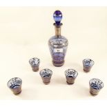 An Italian blue glass liqueur decanter set with silvered decoration