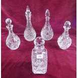 Five various cut glass decanters