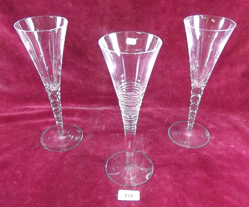 A pair of 'Jasper Conran' Stuart crystal large cut glass wine flutes (one with chip) and one other