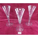 A pair of 'Jasper Conran' Stuart crystal large cut glass wine flutes (one with chip) and one other